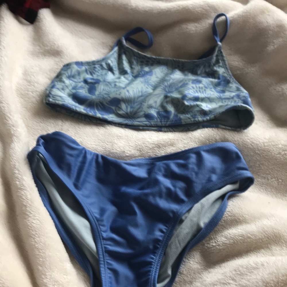 Art class, blue flower bathing suit, slightly pilled.